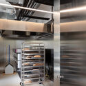 Bakery “Chlieb Náš” / Sadovsky & Architects - Interior Photography, Kitchen, Shelving, Stairs, Handrail
